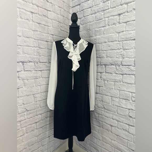 TOMMY HILFIGER
​Ruffle Mini A Line Dress - Picture 5 of 12